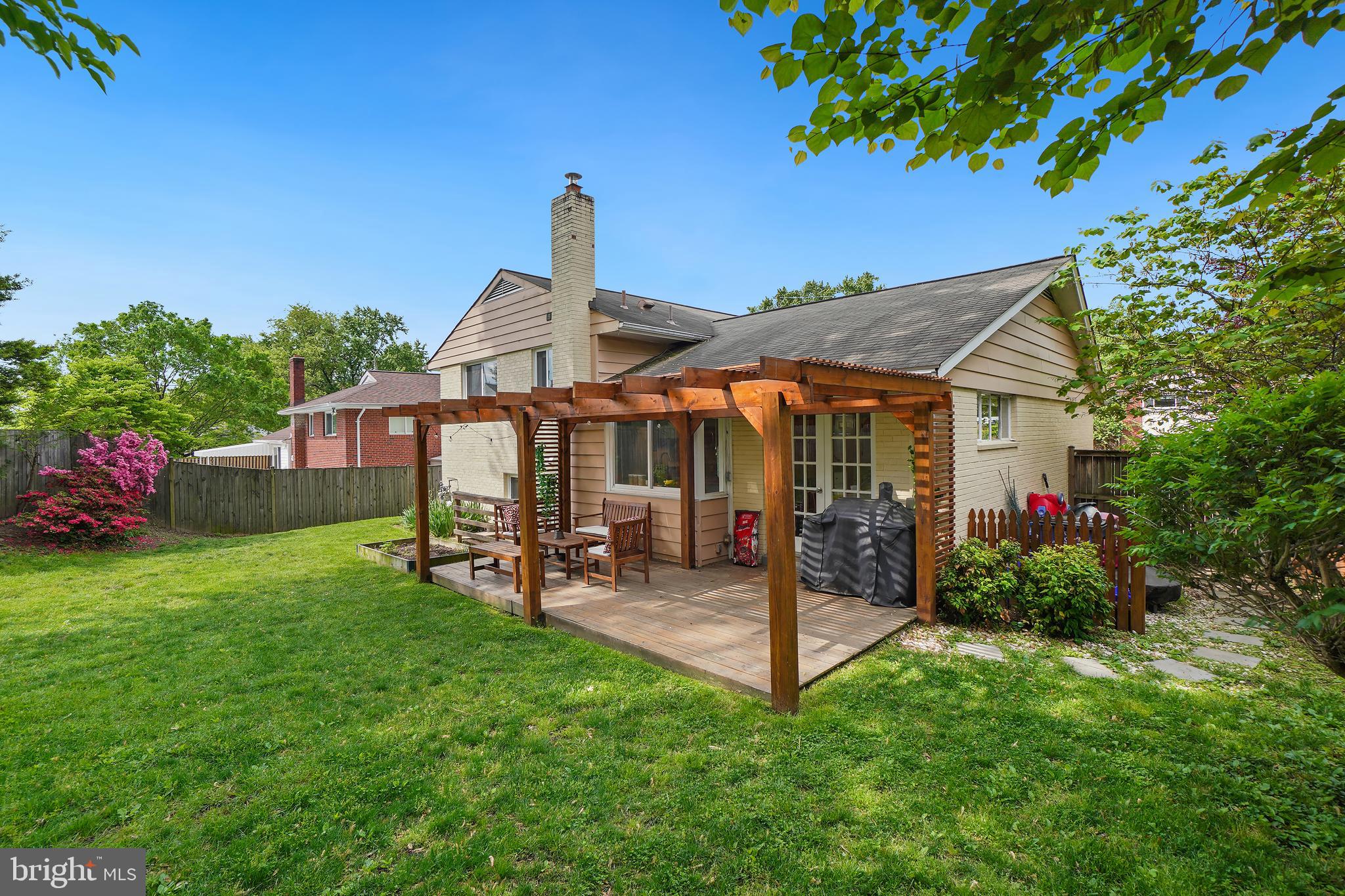 10403 Conover Drive Silver Spring, MD 20902 - Photo 36 of 38 a view of a house with backyard sitting area and garden