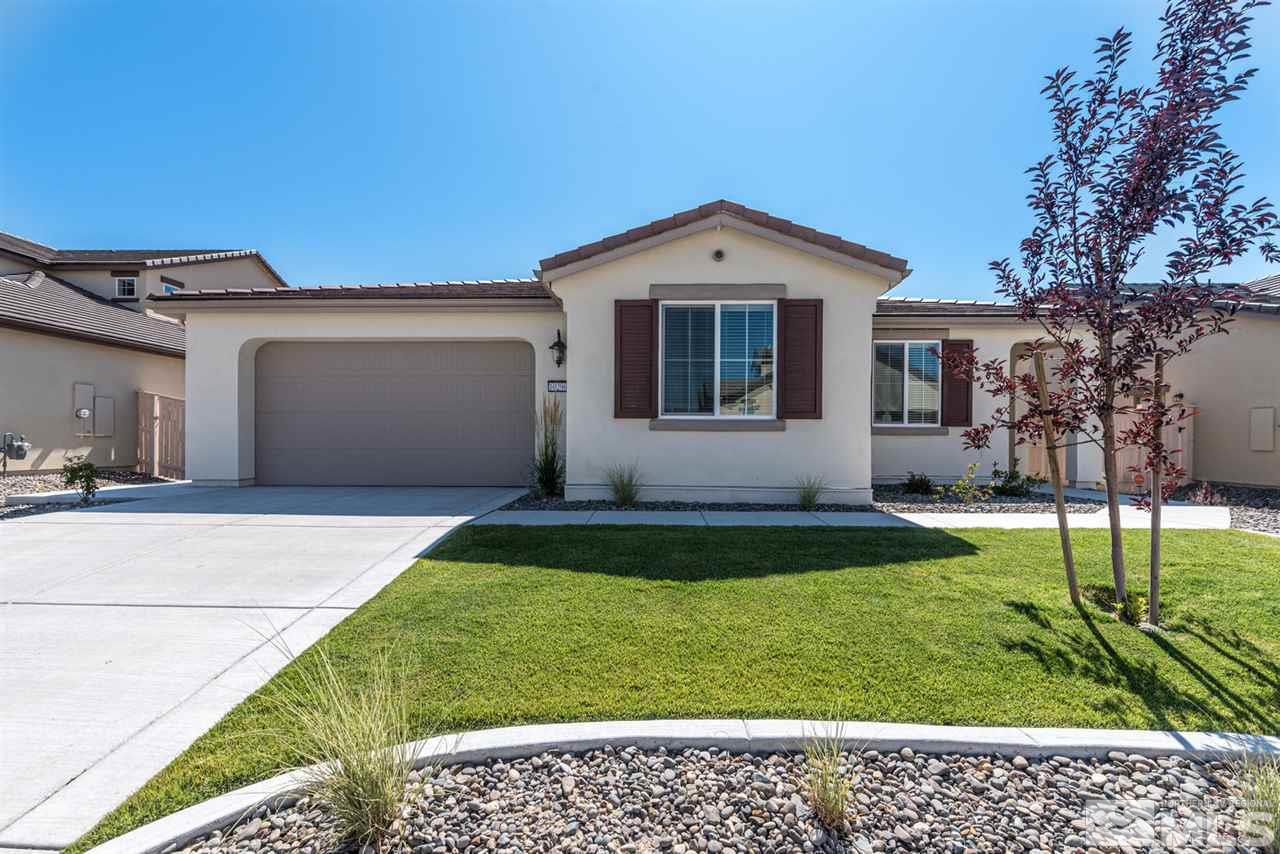 10290 Culiacan Pass Trail Reno, NV 89521 - Photo 1 of 23 a front view of a house with a yard