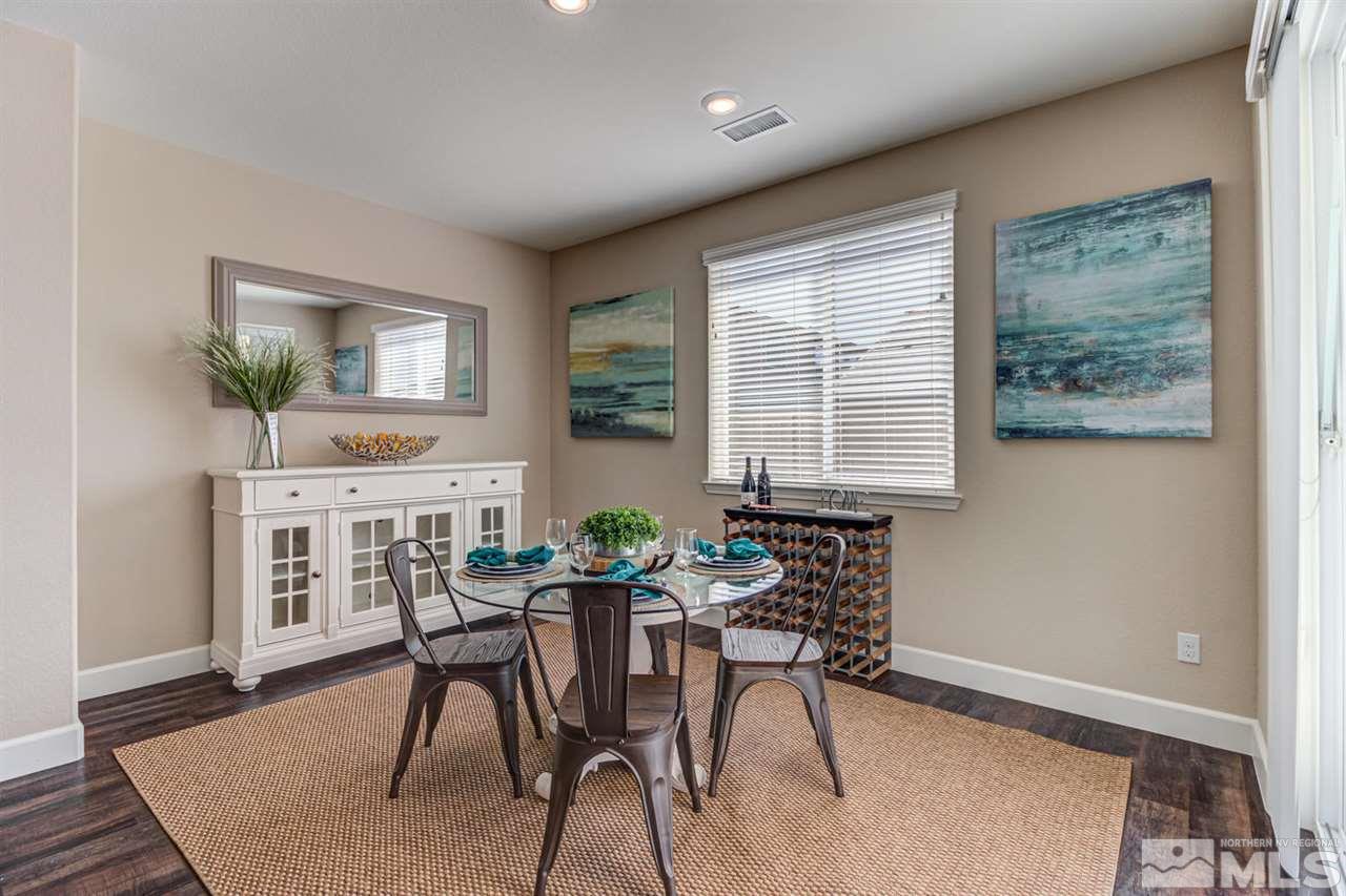 10290 Culiacan Pass Trail Reno, NV 89521 - Photo 11 of 23 a dining room with furniture and window