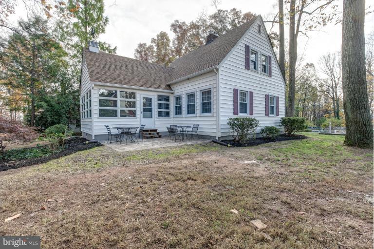 1010 Hart Road Baltimore, MD 21286 - Photo 23 of 30 a front view of house with yard and trees around