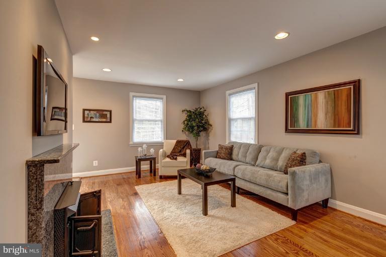 1010 Hart Road Baltimore, MD 21286 - Photo 28 of 30 a living room with furniture and a flat screen tv