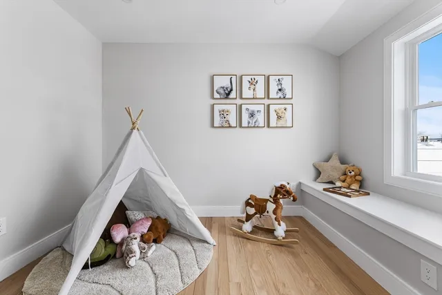a room with toys and white walls