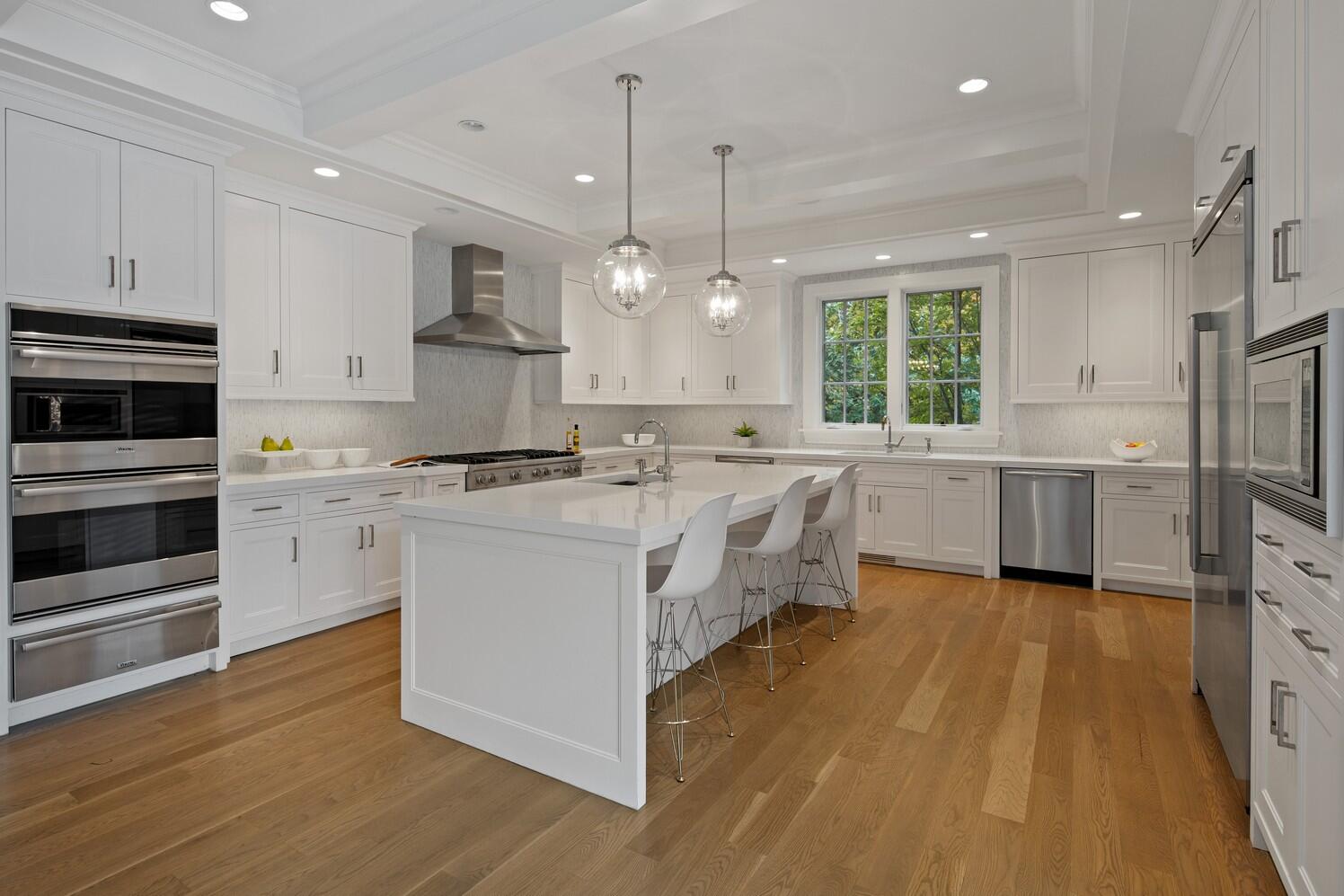 35 Prospect Road Westport, CT 06880 - Photo 11 of 40 a kitchen with stainless steel appliances a stove a sink and a refrigerator