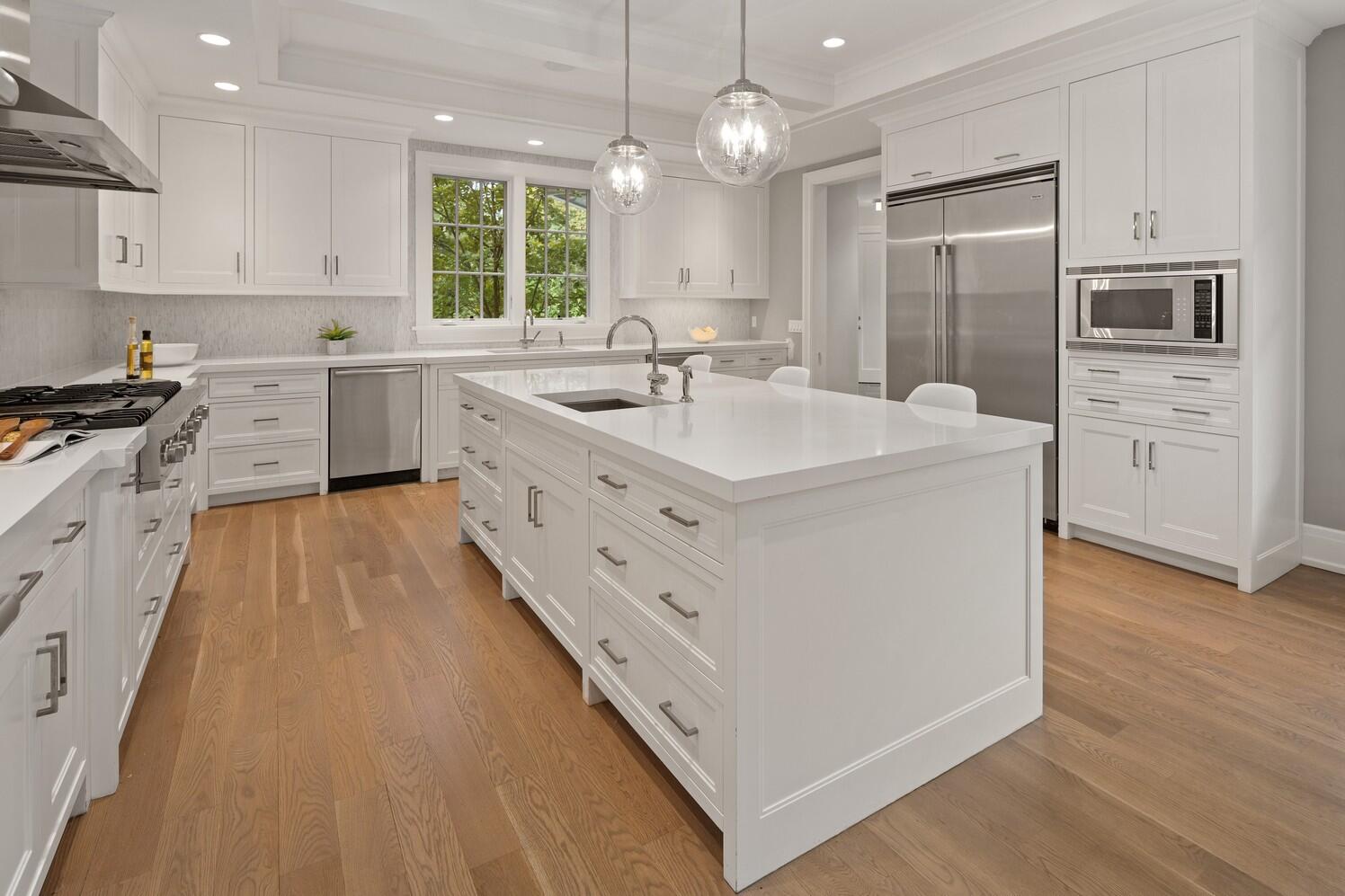 35 Prospect Road Westport, CT 06880 - Photo 12 of 40 a kitchen with white cabinets appliances and window