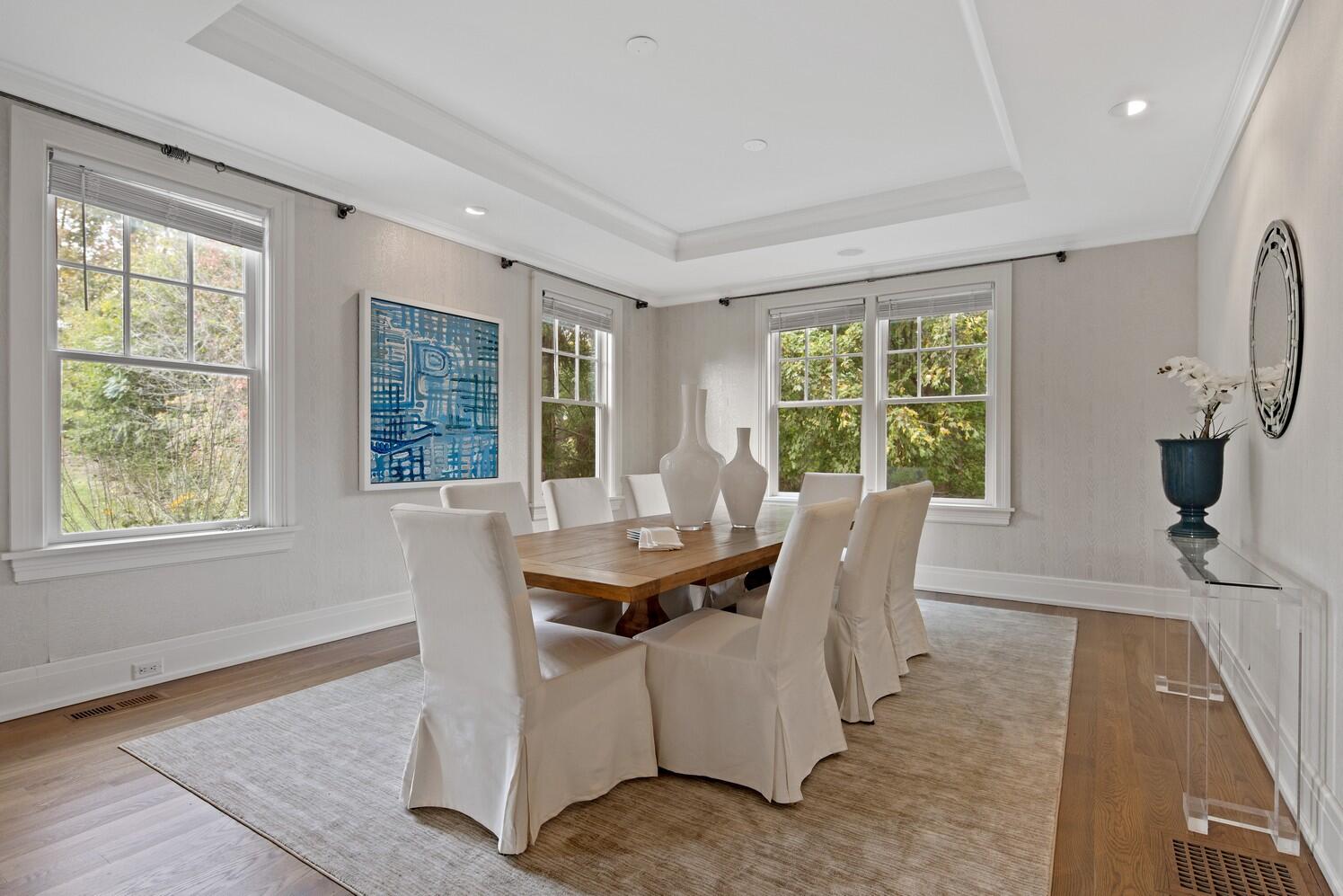 35 Prospect Road Westport, CT 06880 - Photo 14 of 40 a dining room with furniture a chandelier and wooden floor