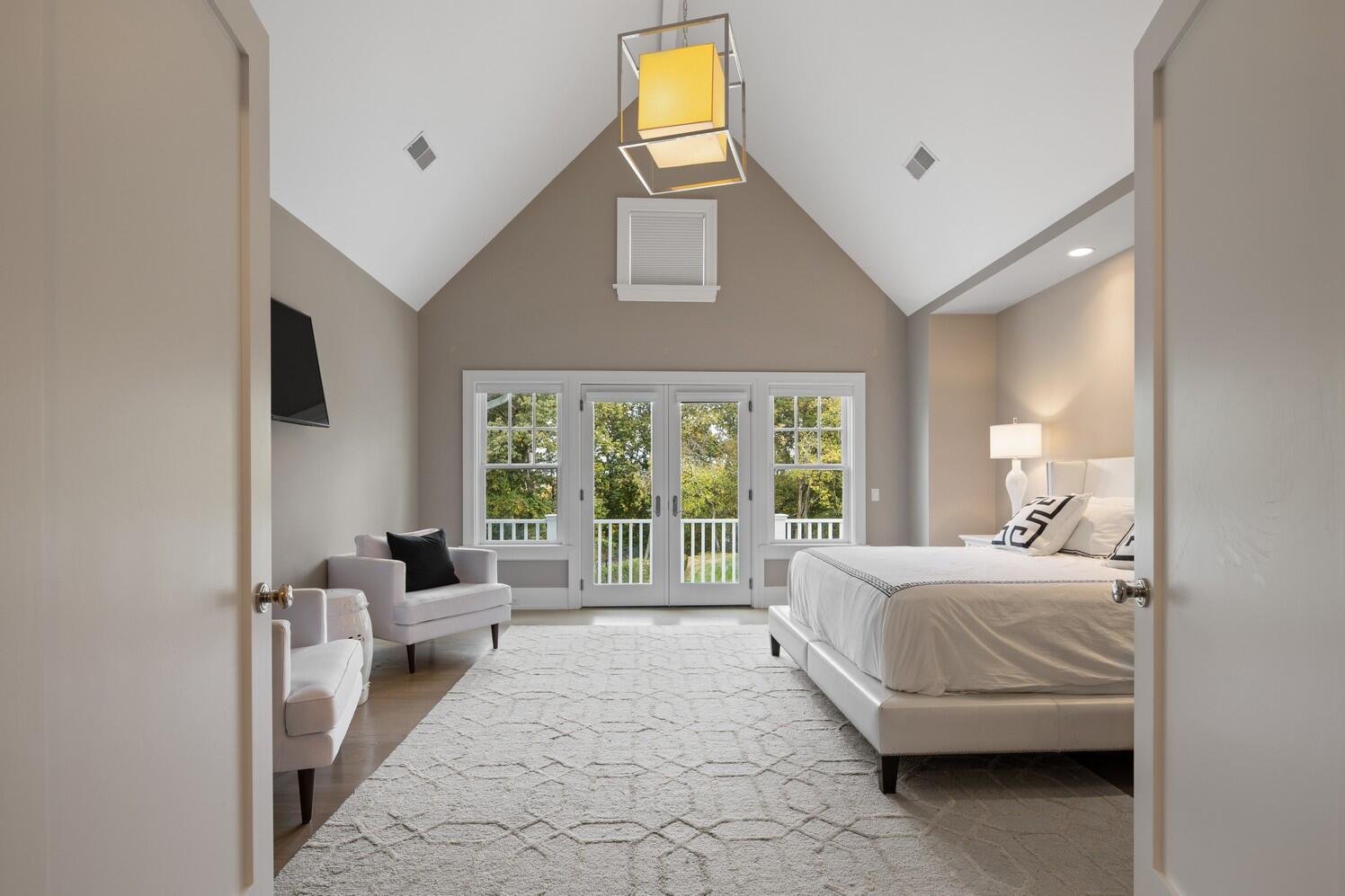 35 Prospect Road Westport, CT 06880 - Photo 21 of 40 a bedroom with a bed and a couch