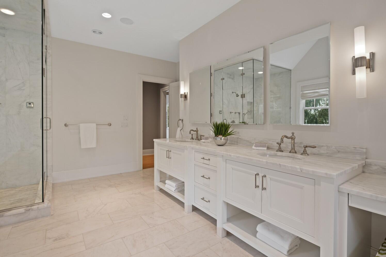35 Prospect Road Westport, CT 06880 - Photo 24 of 40 a spacious bathroom with a granite countertop sink mirror and double