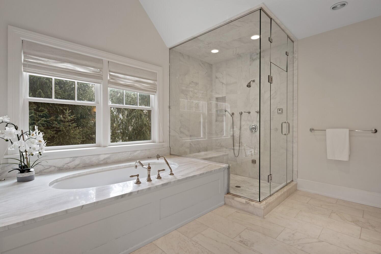 35 Prospect Road Westport, CT 06880 - Photo 25 of 40 a spacious bathroom with a tub shower and windows