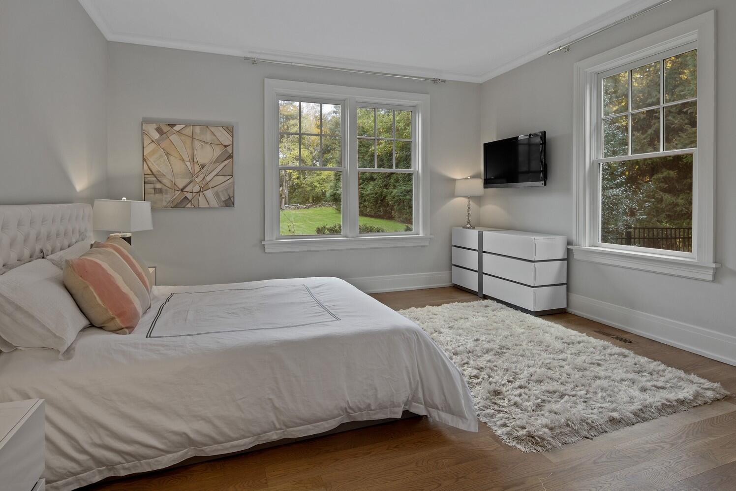 35 Prospect Road Westport, CT 06880 - Photo 32 of 40 a bedroom with a bed and a window