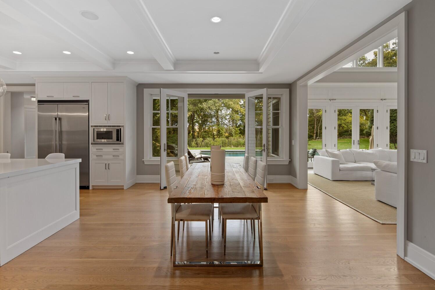 35 Prospect Road Westport, CT 06880 - Photo 9 of 40 a living room with furniture large windows and wooden floor