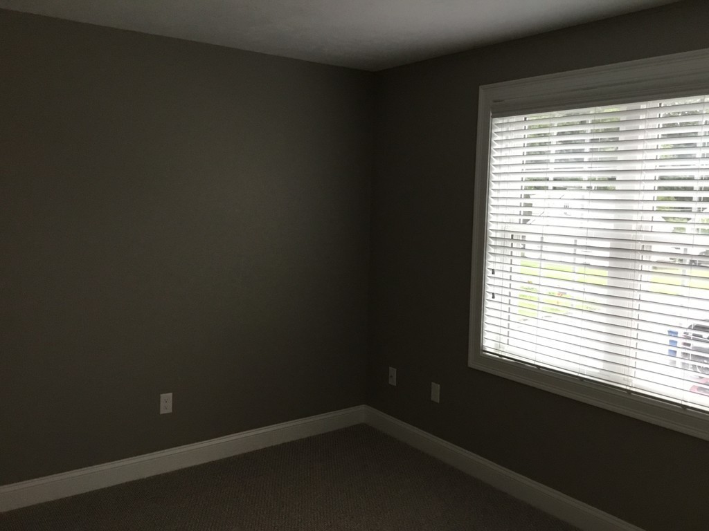 83 D Maple Avenue, Unit D Rutland, MA 01543 - Photo 5 of 12 a view of an empty room with a window
