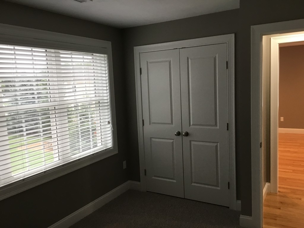 83 D Maple Avenue, Unit D Rutland, MA 01543 - Photo 6 of 12 a view of a bathroom with a window