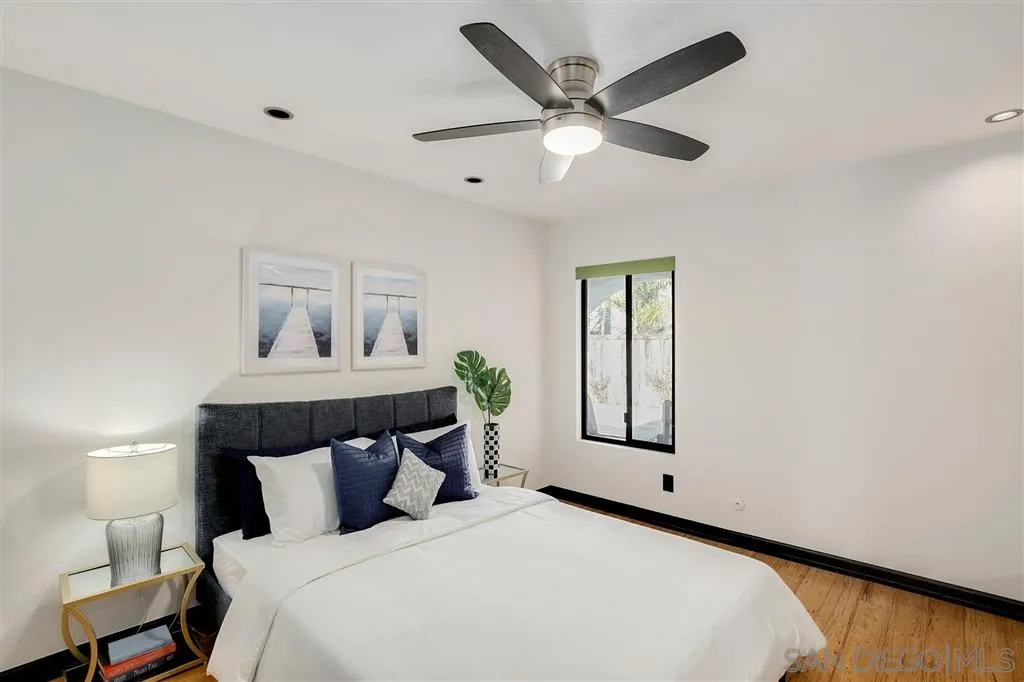 2033 Village Wood Road Encinitas, CA 92024 - Photo 20 of 25 a bed room with a bed and a window
