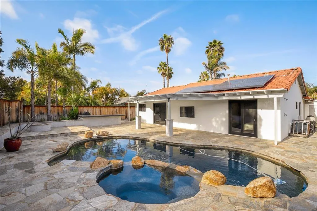 2033 Village Wood Road Encinitas, CA 92024 - Photo 23 of 25 a view of a house with swimming pool and sitting area