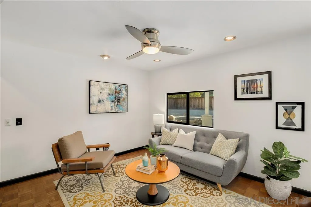 2033 Village Wood Road Encinitas, CA 92024 - Photo 9 of 25 a living room with furniture and a large window