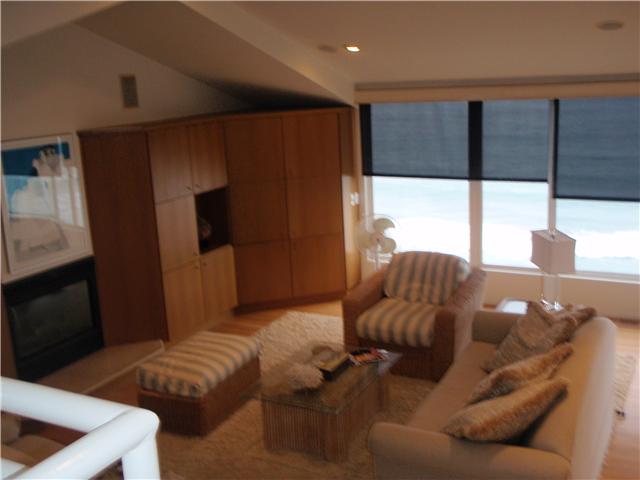 1722 Tattenham Road Encinitas, CA 92024 - Photo 2 of 12 Living room has been expanded for more square footage. Fireplace and custom built-in cabinetry.