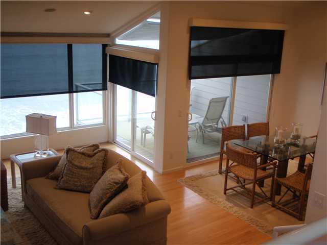 1722 Tattenham Road Encinitas, CA 92024 - Photo 5 of 12 Looking from entry to living room and dining area. Two sliders open unto oceanfront deck. Hardwood flooring throughout.