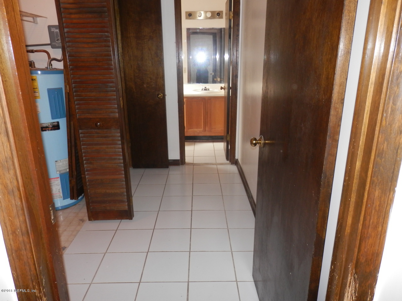 3972 Dowling Road Middleburg, FL 32068 - Photo 17 of 27 Hall to laundry room and bath #2