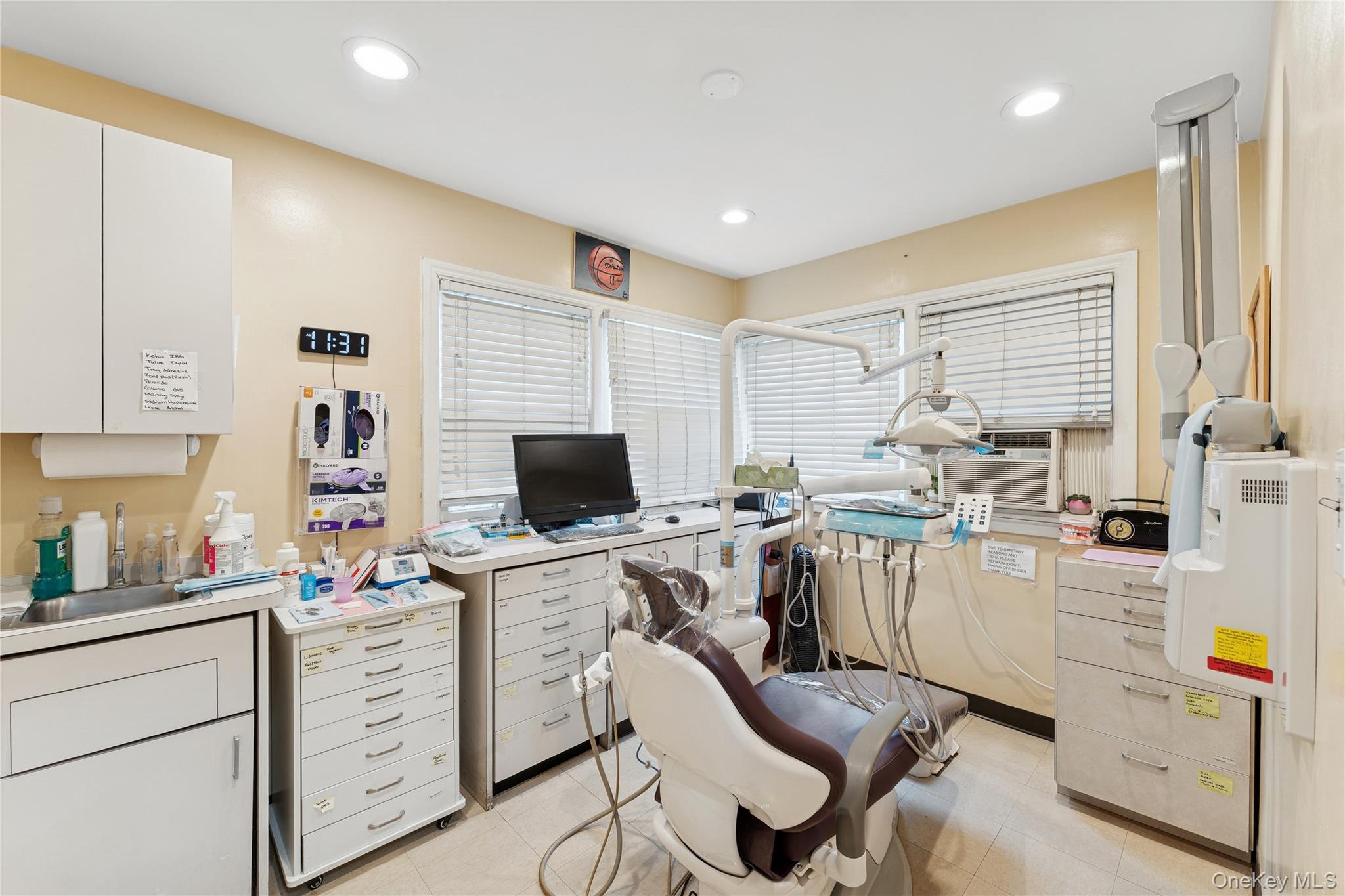 5 Seaton Gate Valley Stream, NY 11580 - Photo 11 of 36 a view of a workspace with furniture and a window