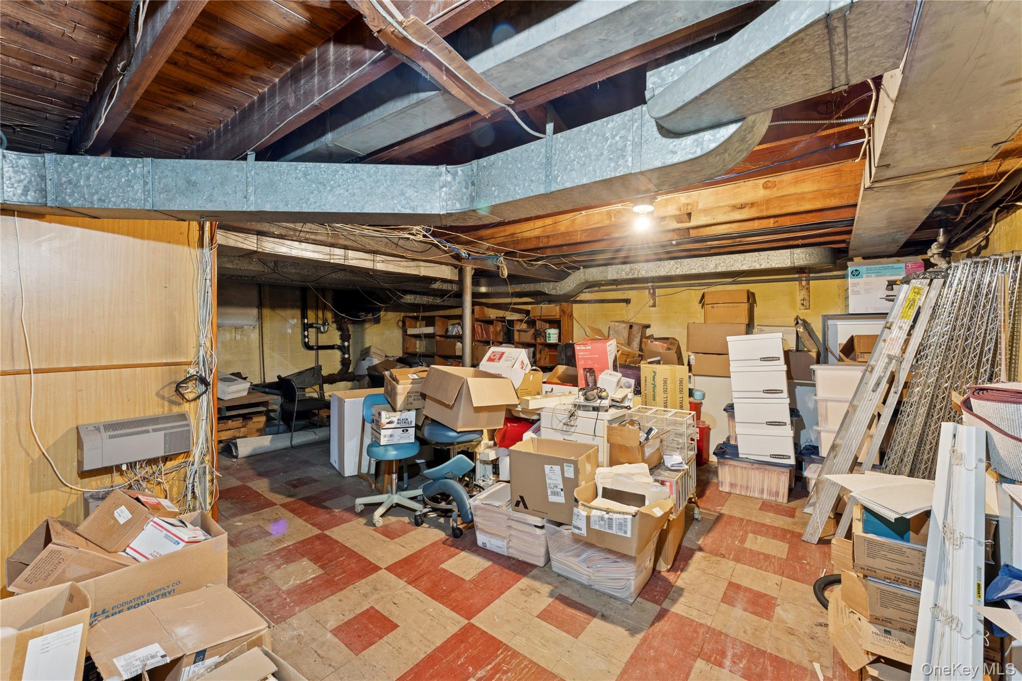5 Seaton Gate Valley Stream, NY 11580 - Photo 31 of 36 a view of a room with gym equipment