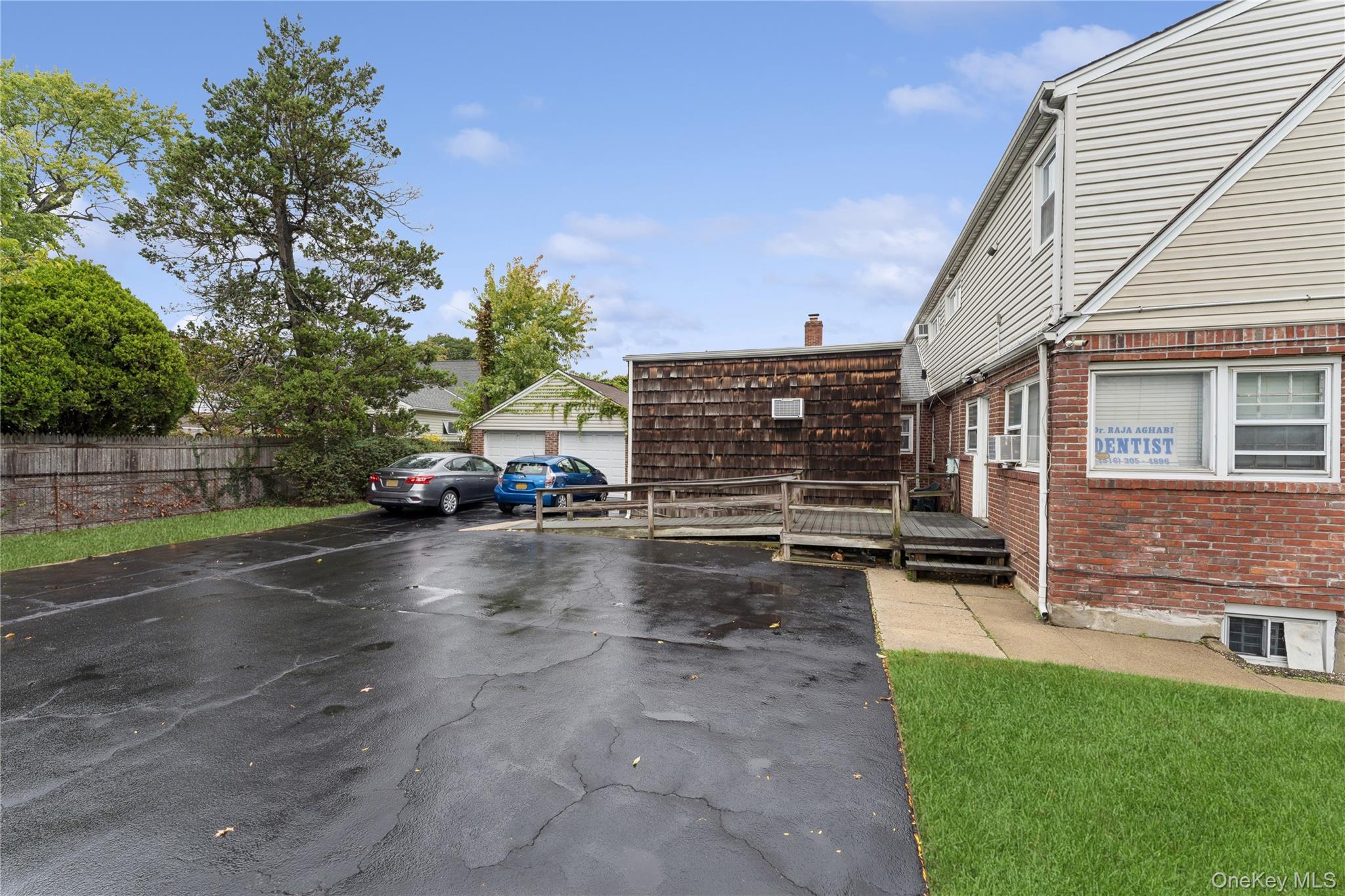 5 Seaton Gate Valley Stream, NY 11580 - Photo 34 of 36 a car parked in front of a house