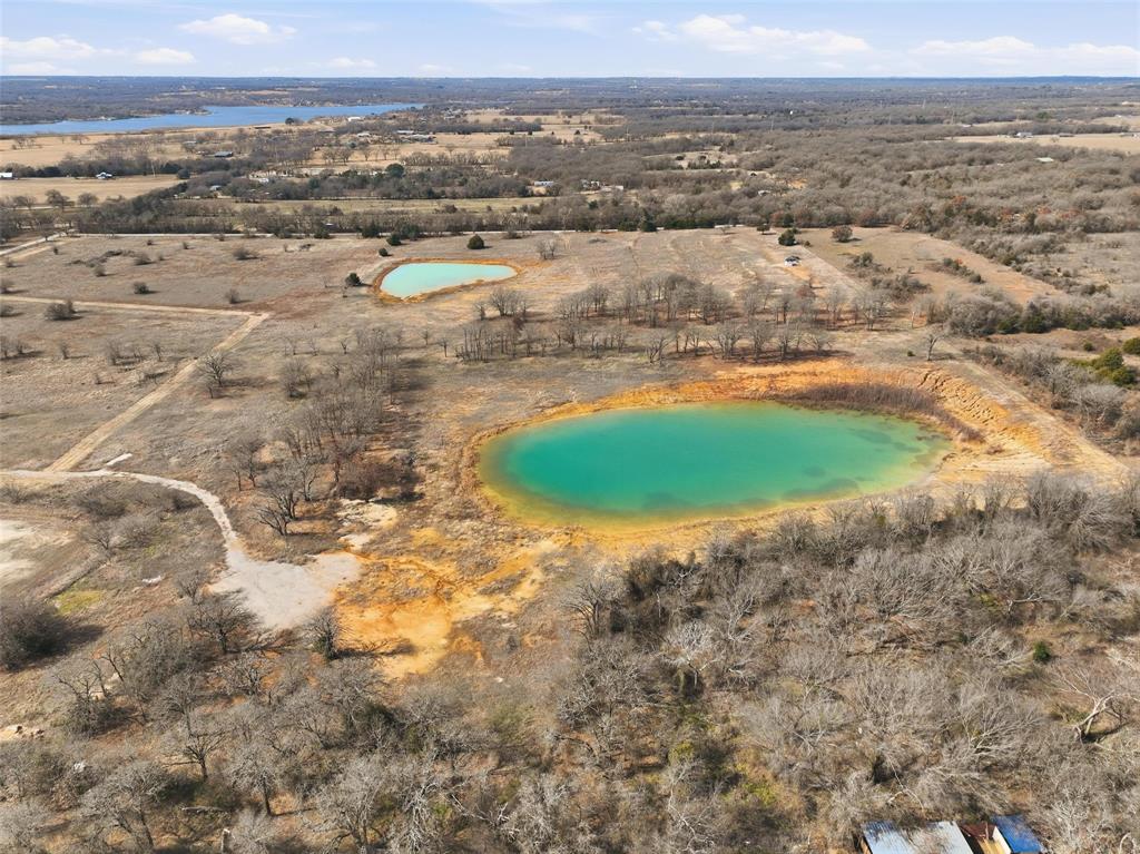 935 County Road 404 Alvarado, TX 76009 - Photo 3 of 21 an aerial view of residential houses with outdoor space
