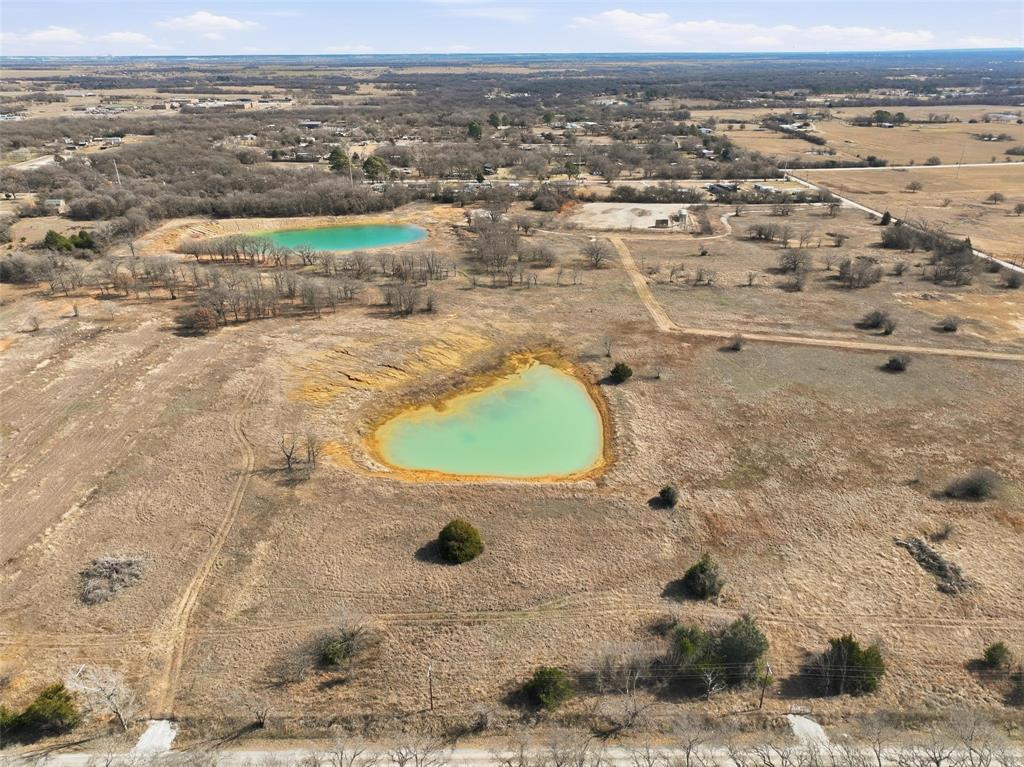935 County Road 404 Alvarado, TX 76009 - Photo 8 of 21 an aerial view of residential houses with outdoor space