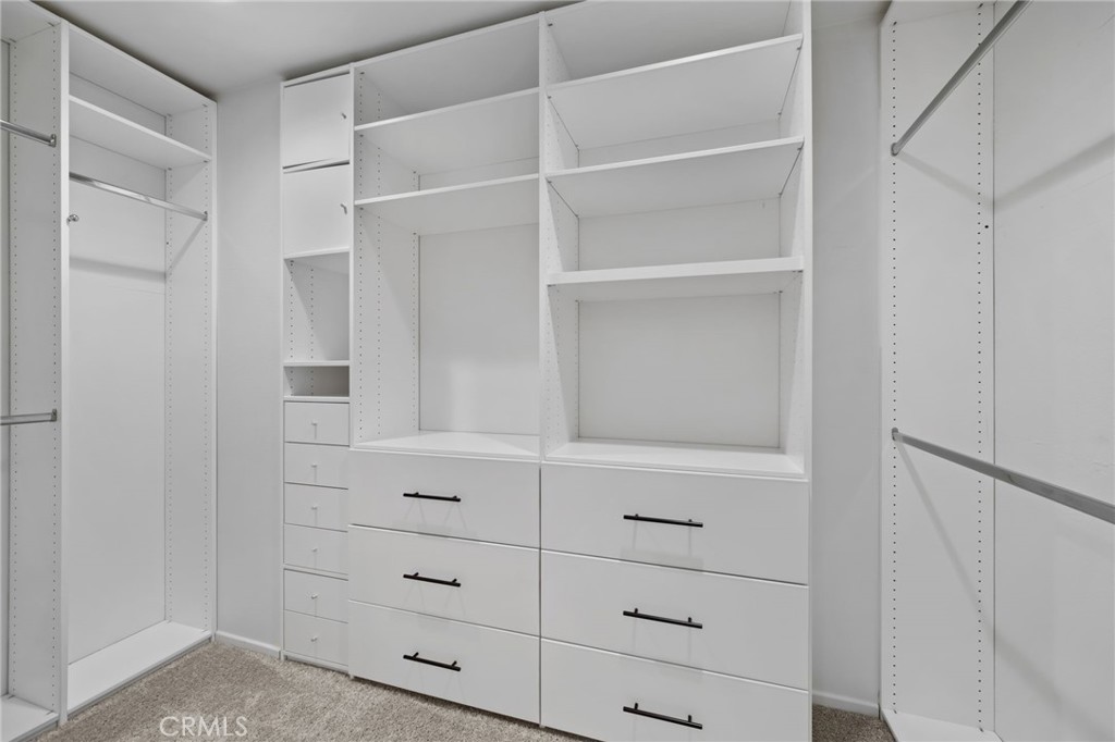24085 Midvale Court Corona, CA 92883 - Photo 25 of 56 a view of an empty walk in closet