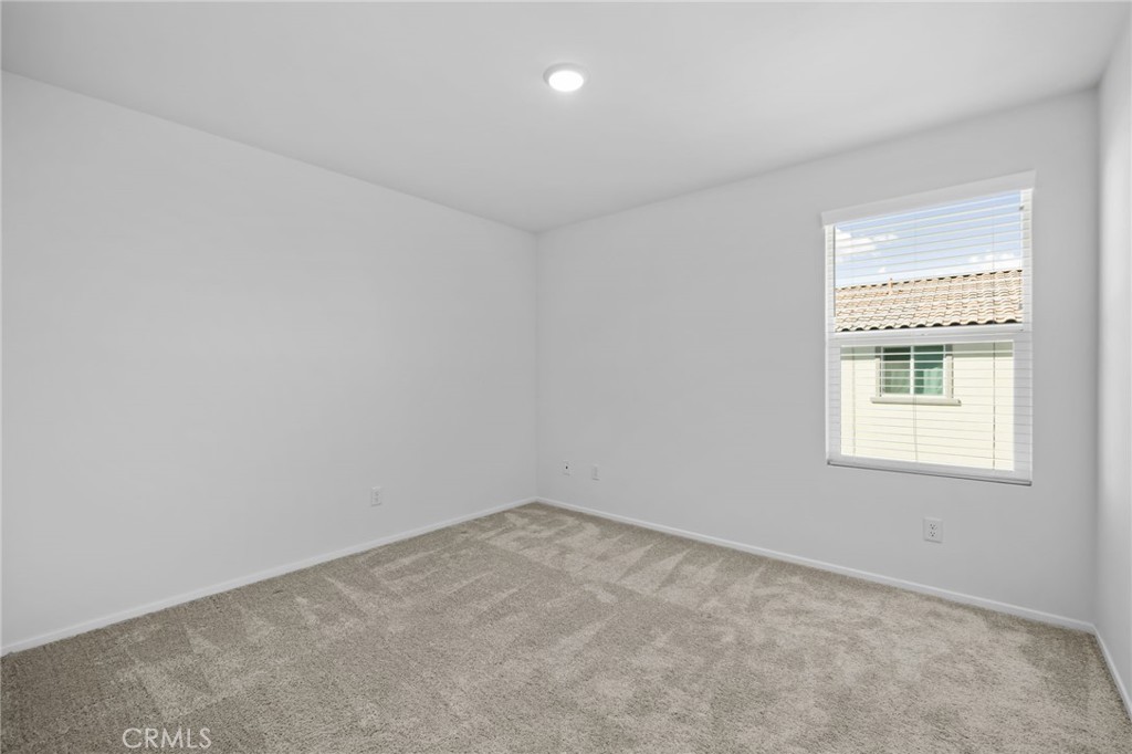 24085 Midvale Court Corona, CA 92883 - Photo 26 of 56 an empty room with a window