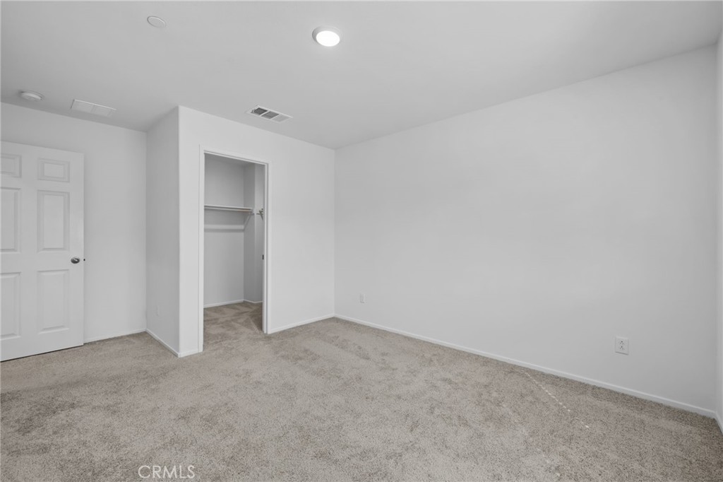 24085 Midvale Court Corona, CA 92883 - Photo 29 of 56 an empty room with closet area