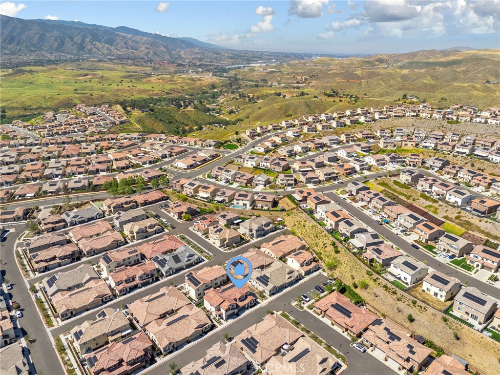 24085 Midvale Court Corona, CA 92883 - Photo 39 of 56 an aerial view of residential building and ocean