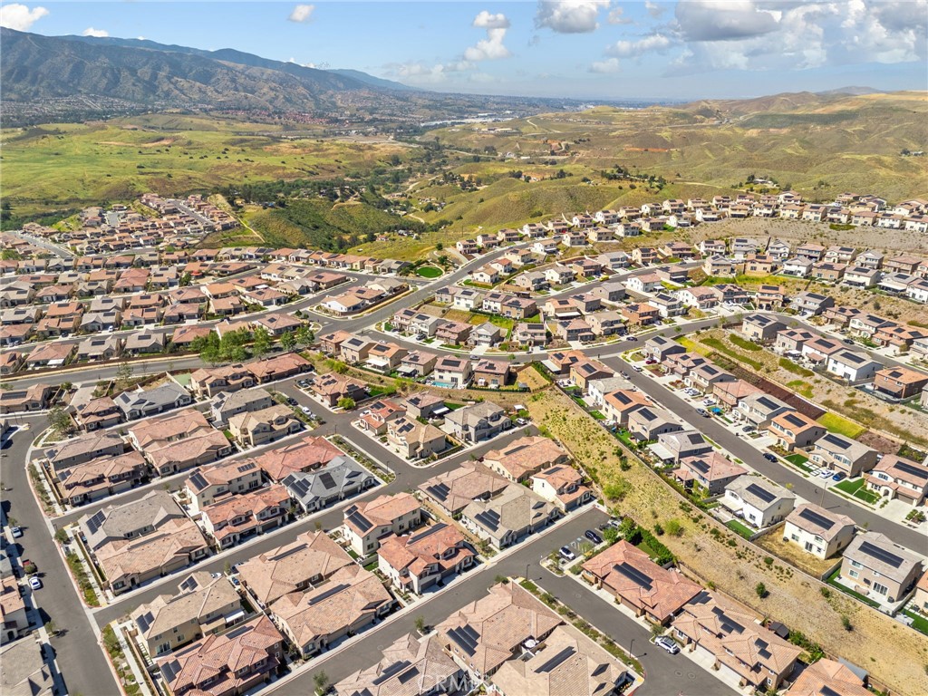 24085 Midvale Court Corona, CA 92883 - Photo 42 of 56 an aerial view of residential building and ocean