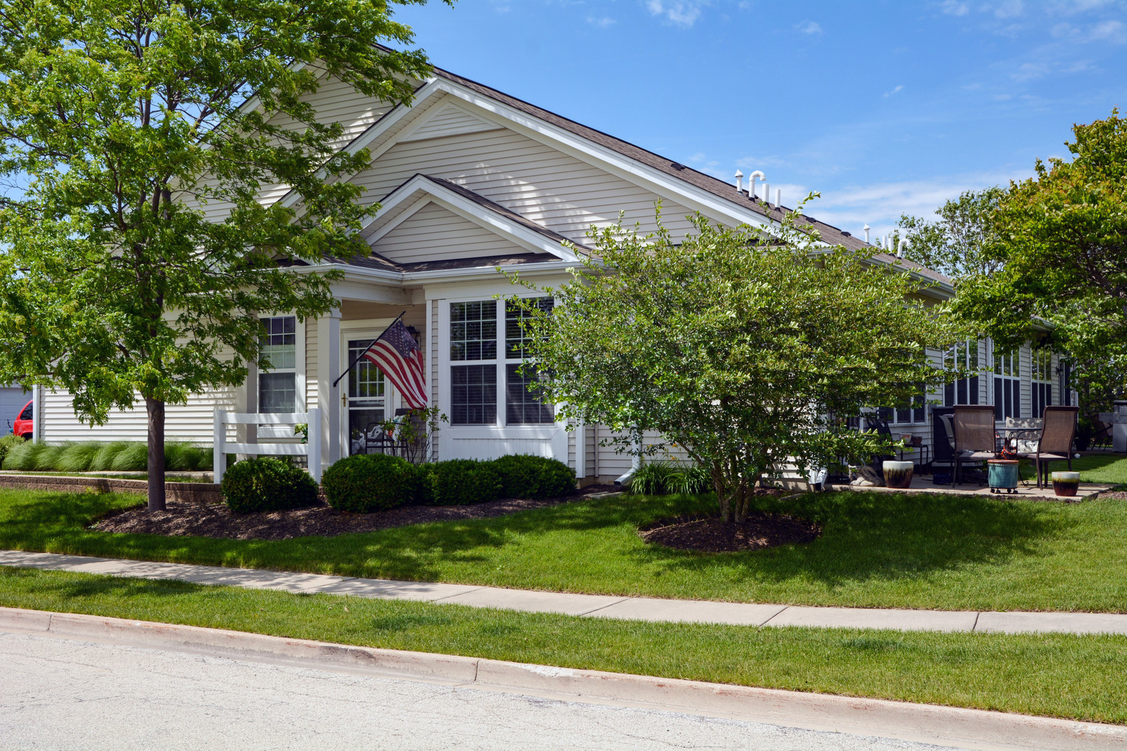 13482 Delaney Road Huntley, IL 60142 - Photo 1 of 18 a front view of a house with a yard
