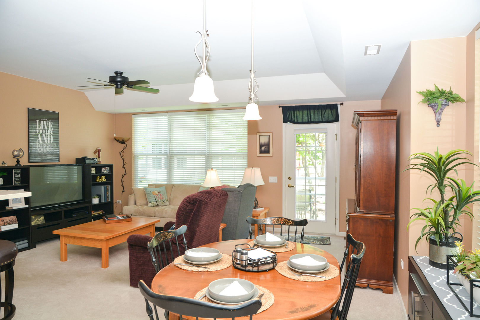 13482 Delaney Road Huntley, IL 60142 - Photo 2 of 18 a dining room with furniture window and wooden floor