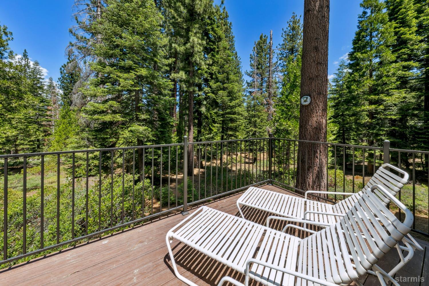 1730 Inca Way South Lake Tahoe, CA 96150 - Photo 22 of 32 a view of a wooden deck next to a yard