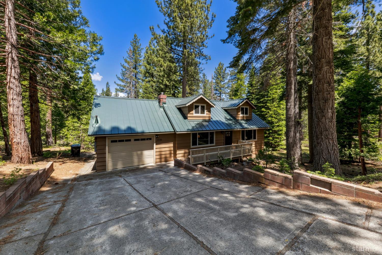 1730 Inca Way South Lake Tahoe, CA 96150 - Photo 3 of 32 a view of a house with a yard
