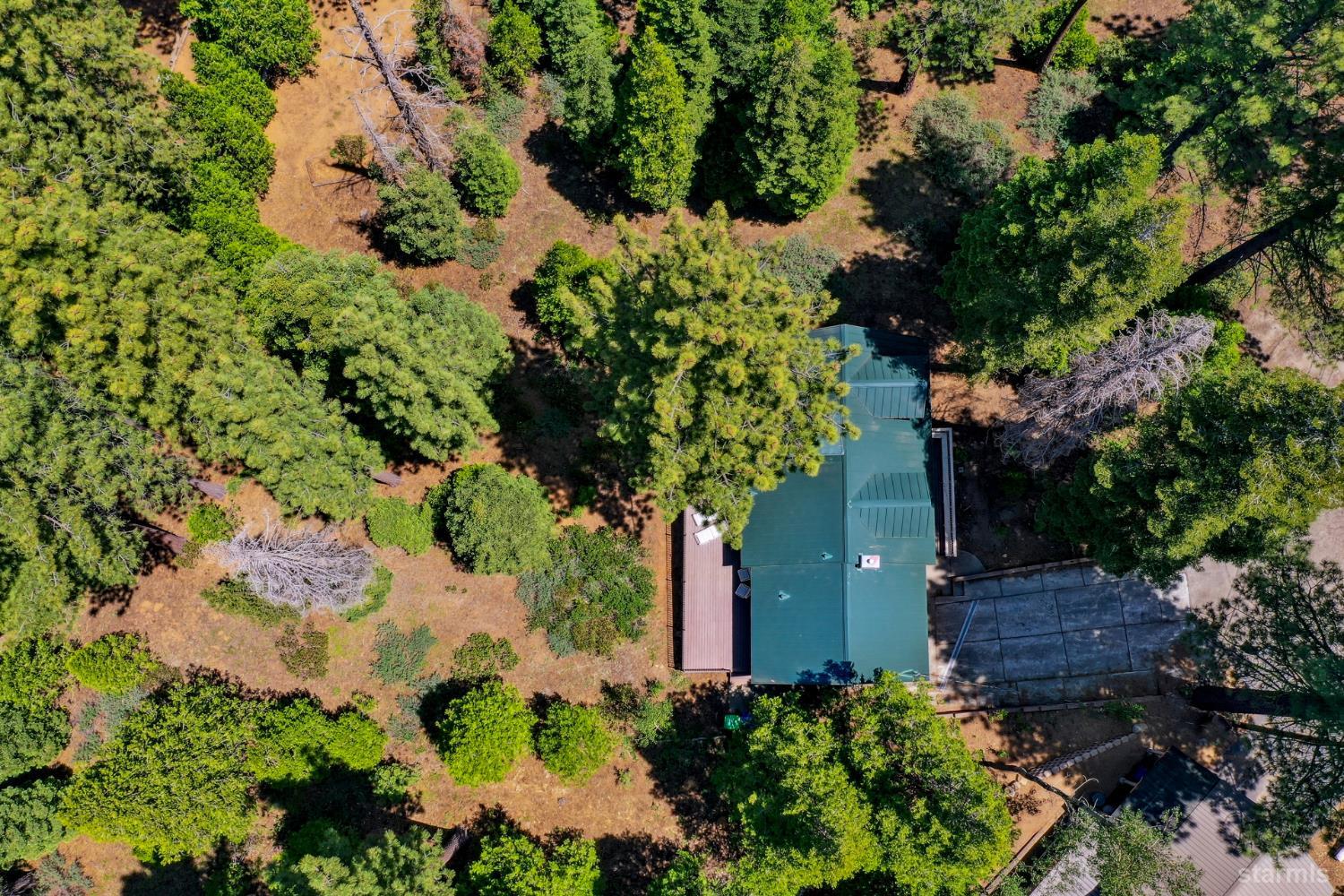 1730 Inca Way South Lake Tahoe, CA 96150 - Photo 31 of 32 an aerial view of a house with a yard