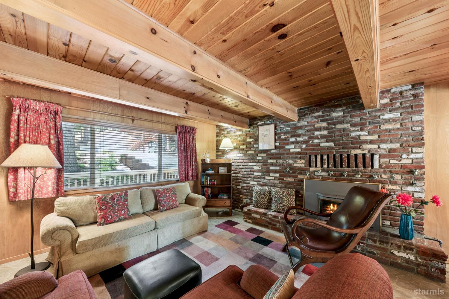 1730 Inca Way South Lake Tahoe, CA 96150 - Photo 6 of 32 a work room with furniture and a floor to ceiling window