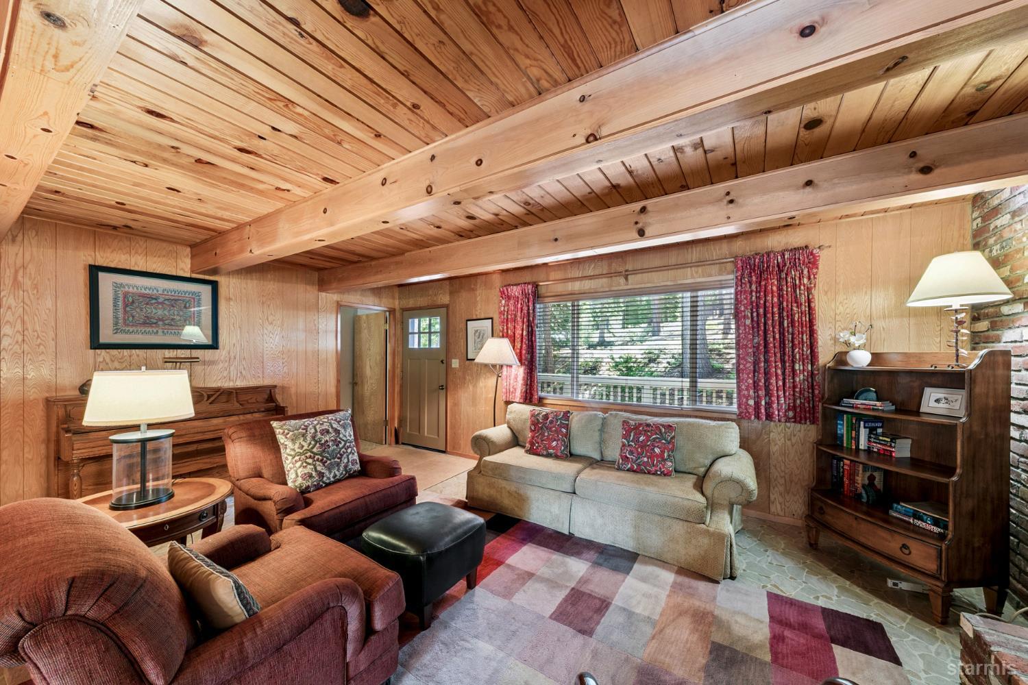 1730 Inca Way South Lake Tahoe, CA 96150 - Photo 7 of 32 a living room with furniture and a large window