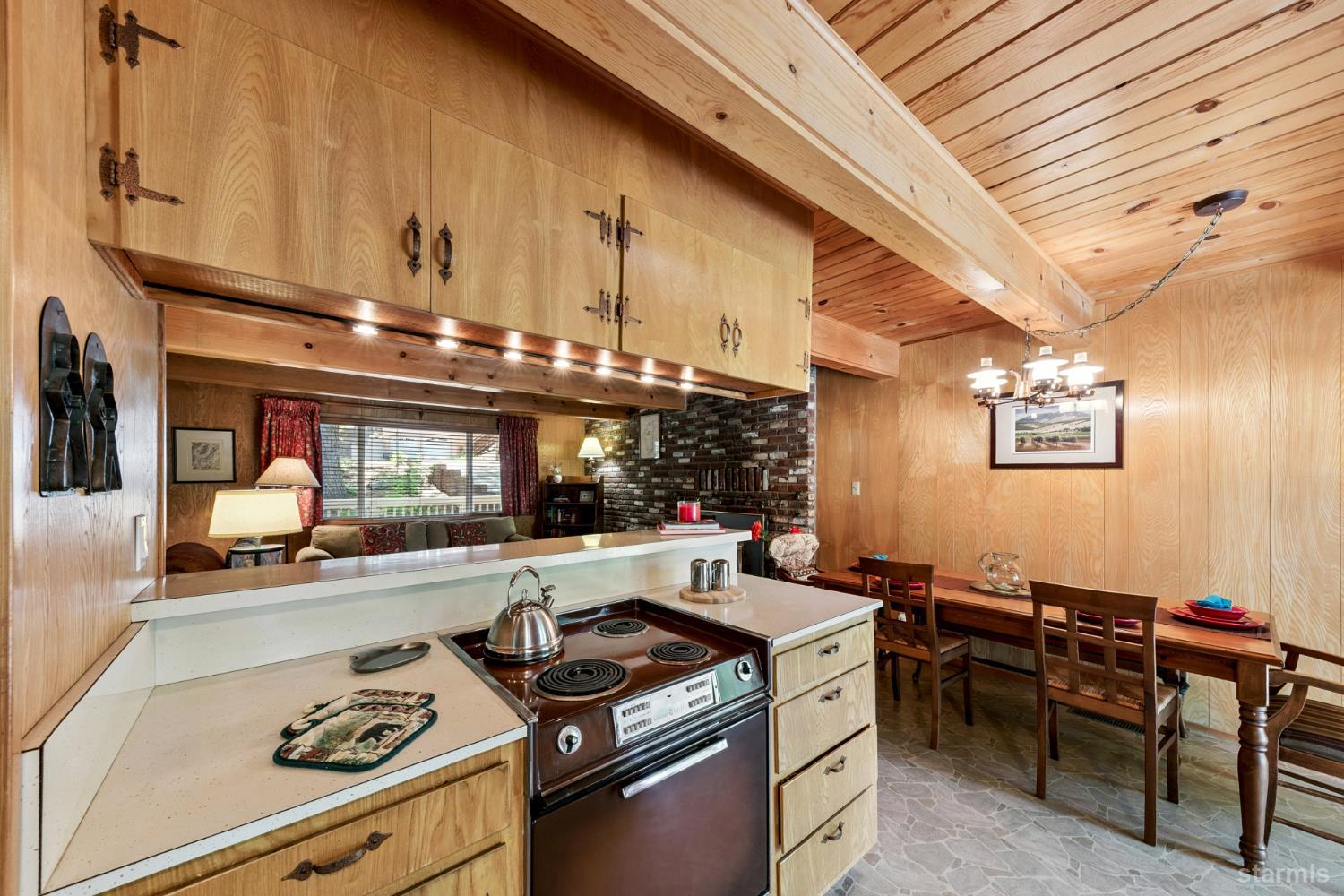 1730 Inca Way South Lake Tahoe, CA 96150 - Photo 10 of 32 a kitchen with a stove and a refrigerator