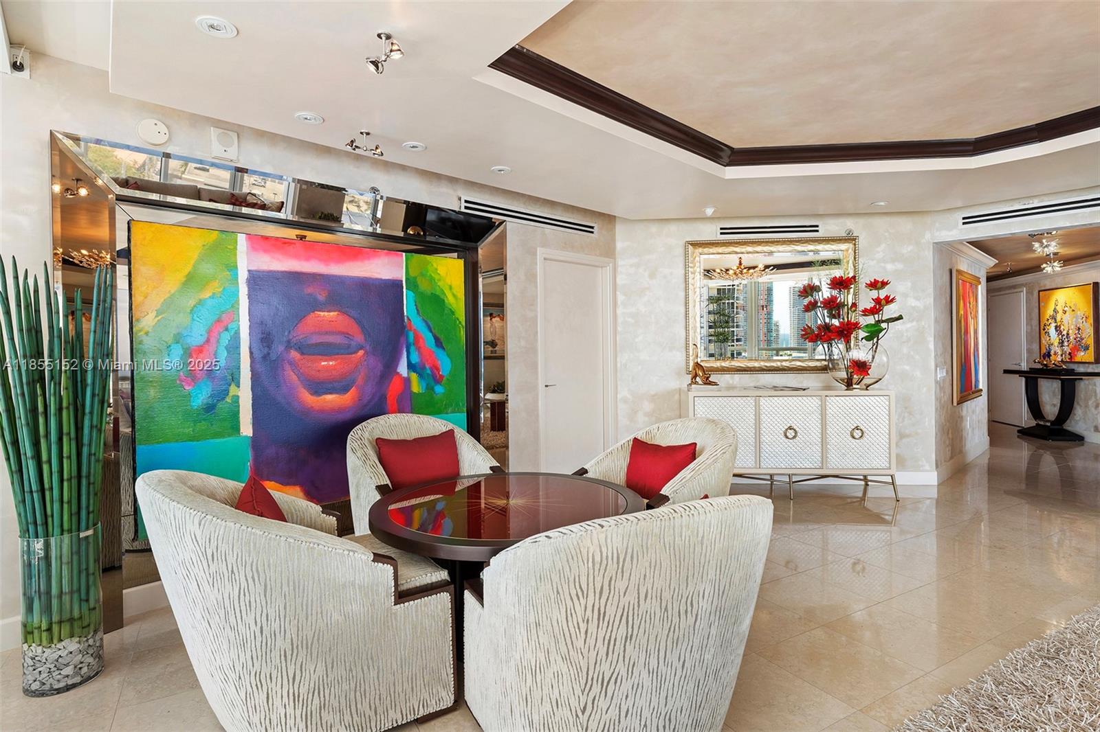 450 Alton Road, Unit 1907 Miami Beach, FL 33139 - Photo 11 of 64 a living room with furniture and painting on the wall