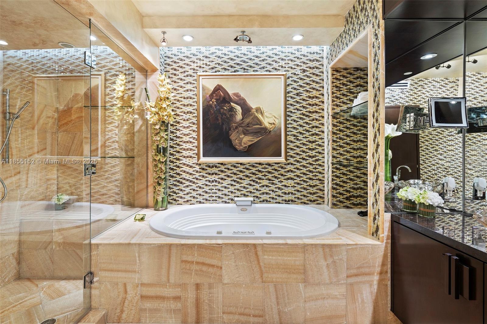 450 Alton Road, Unit 1907 Miami Beach, FL 33139 - Photo 29 of 64 a bathroom with a sink toilet and shower