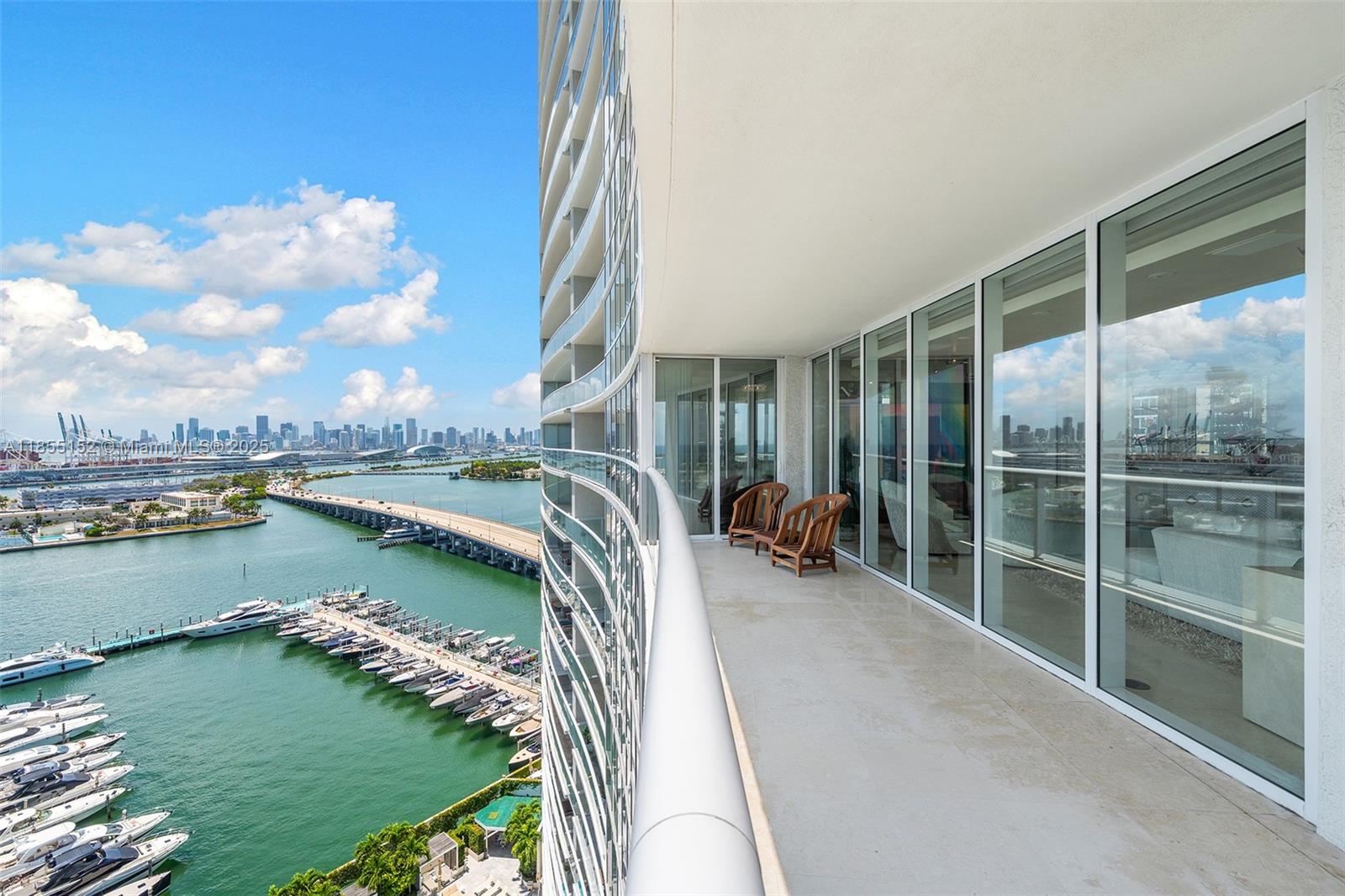 450 Alton Road, Unit 1907 Miami Beach, FL 33139 - Photo 3 of 64 a view of a balcony with lake view