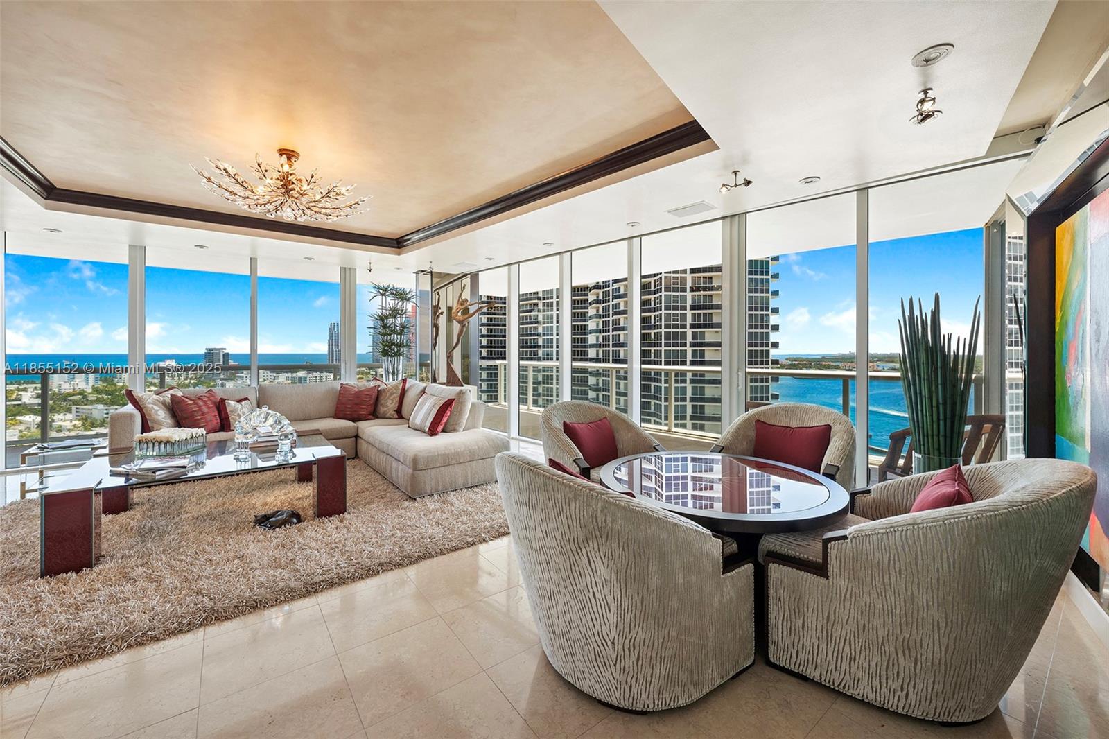 450 Alton Road, Unit 1907 Miami Beach, FL 33139 - Photo 5 of 64 a living room with furniture and a large window