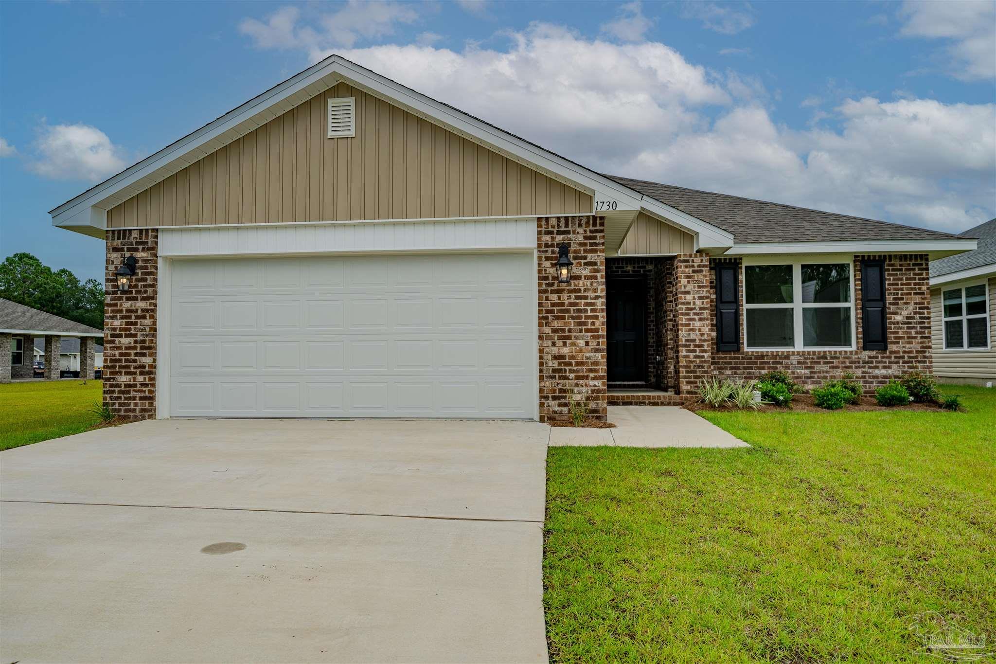 a front view of house with yard