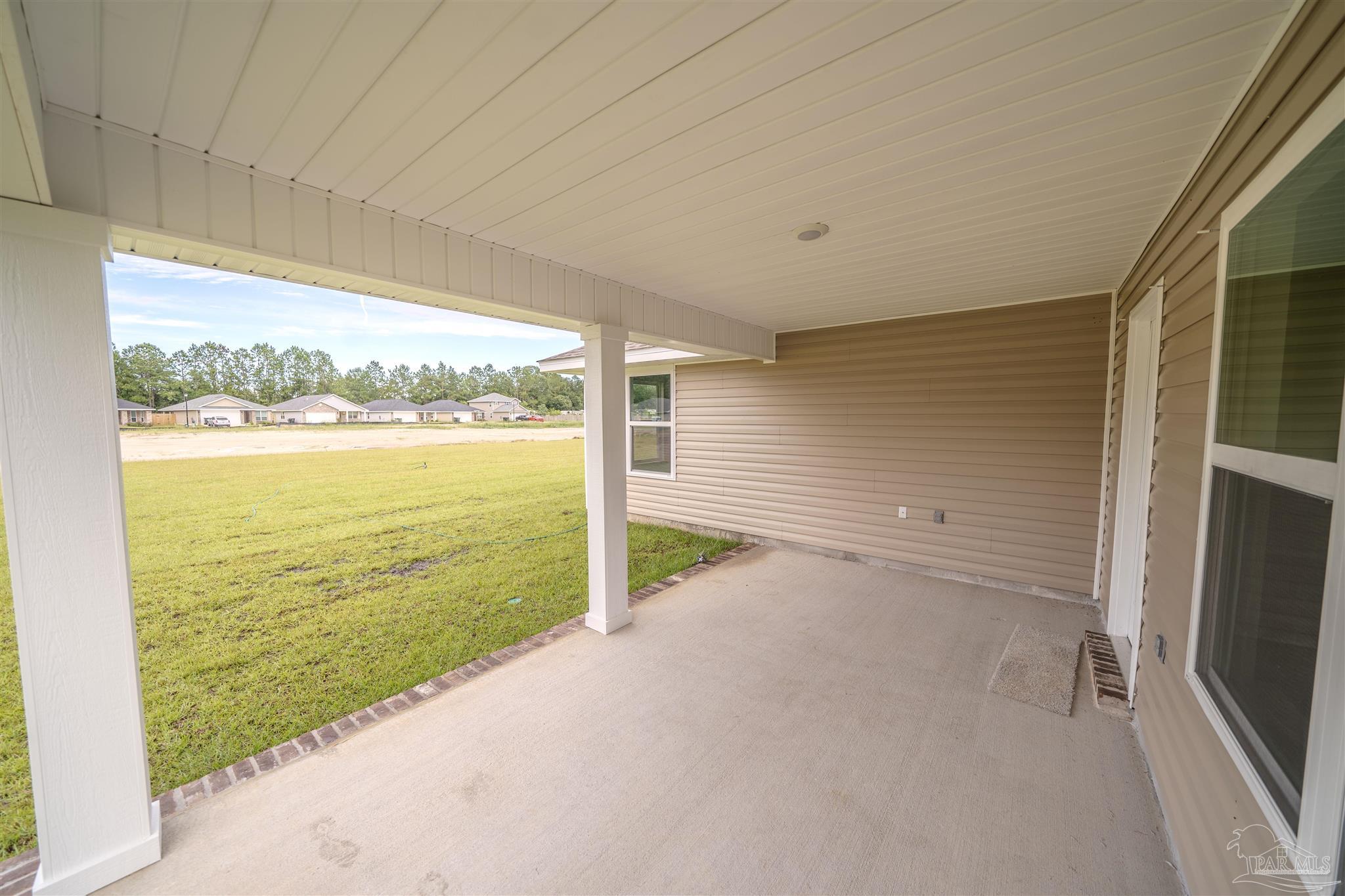 1730 Leigh Loop, Unit 18D Cantonment, FL 32533 - Photo 16 of 18 a view of an empty room and a window