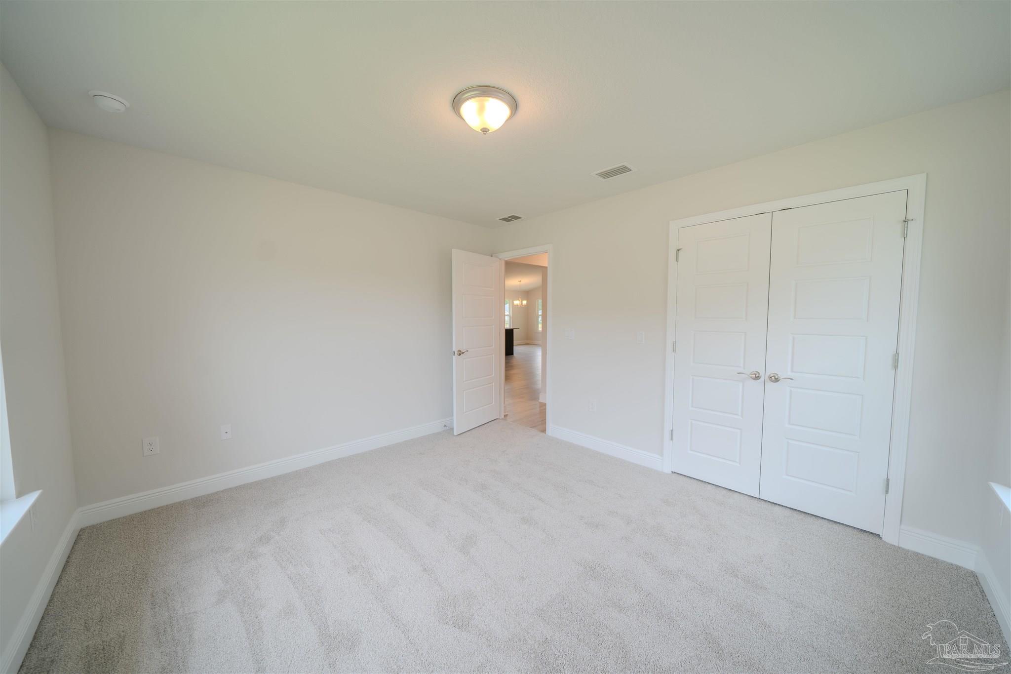 1730 Leigh Loop, Unit 18D Cantonment, FL 32533 - Photo 6 of 18 a view of an empty room