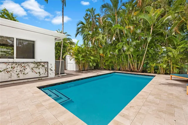 a view of an outdoor space and a swimming pool