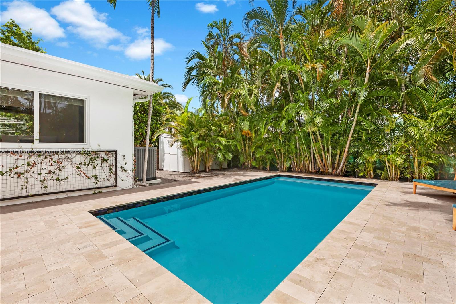 9065 Emerson Avenue Surfside, FL 33154 - Photo 26 of 50 a view of an outdoor space and a swimming pool
