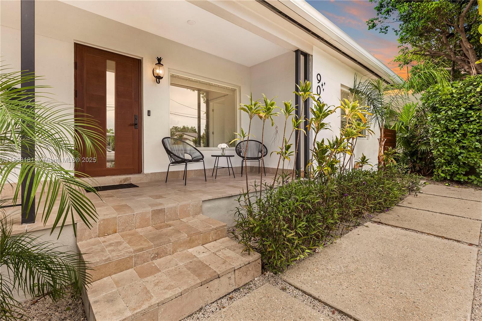 9065 Emerson Avenue Surfside, FL 33154 - Photo 43 of 50 a view of outdoor space yard and porch